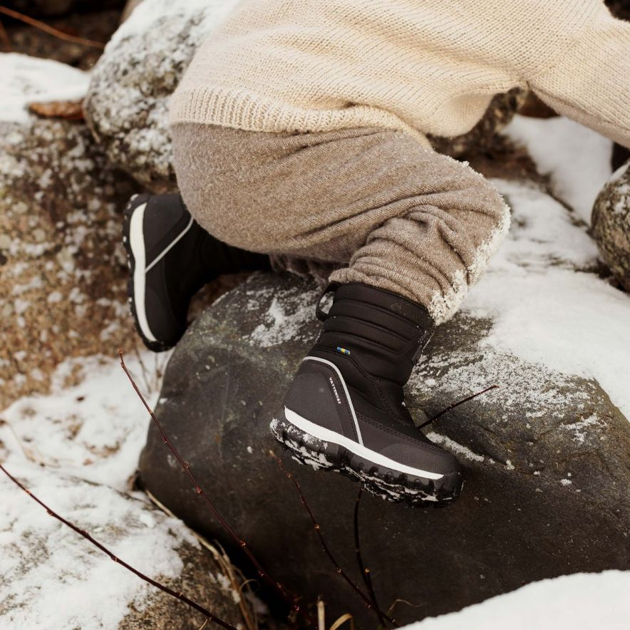 Comfortable and warm outdoor boots built for winter exploration and snow fun