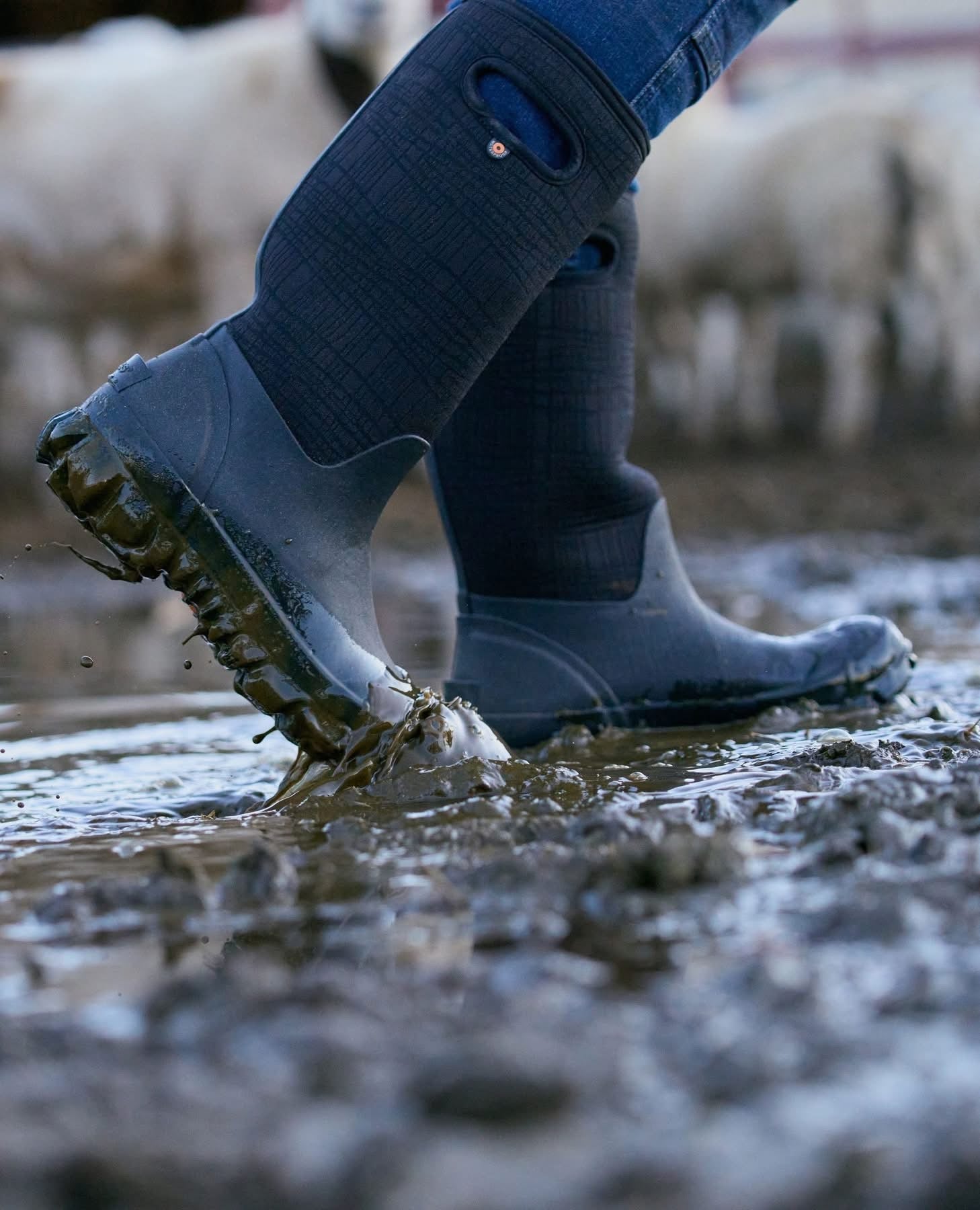 Heavy-duty waterproof boots – insulated, slip-resistant outdoor footwear for rain, mud, and cold-weather activities.