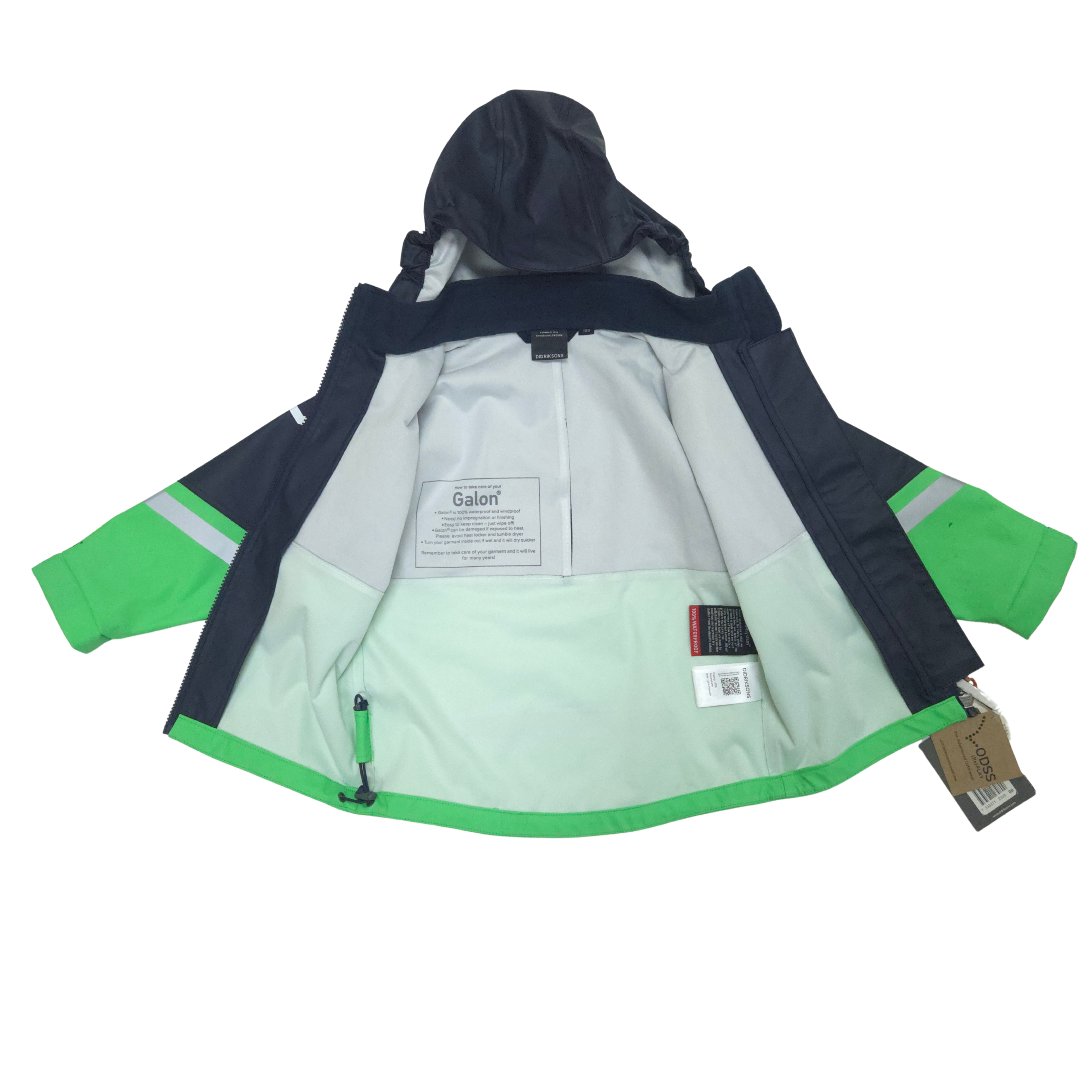 Children's jacket with green and navy design on a white background