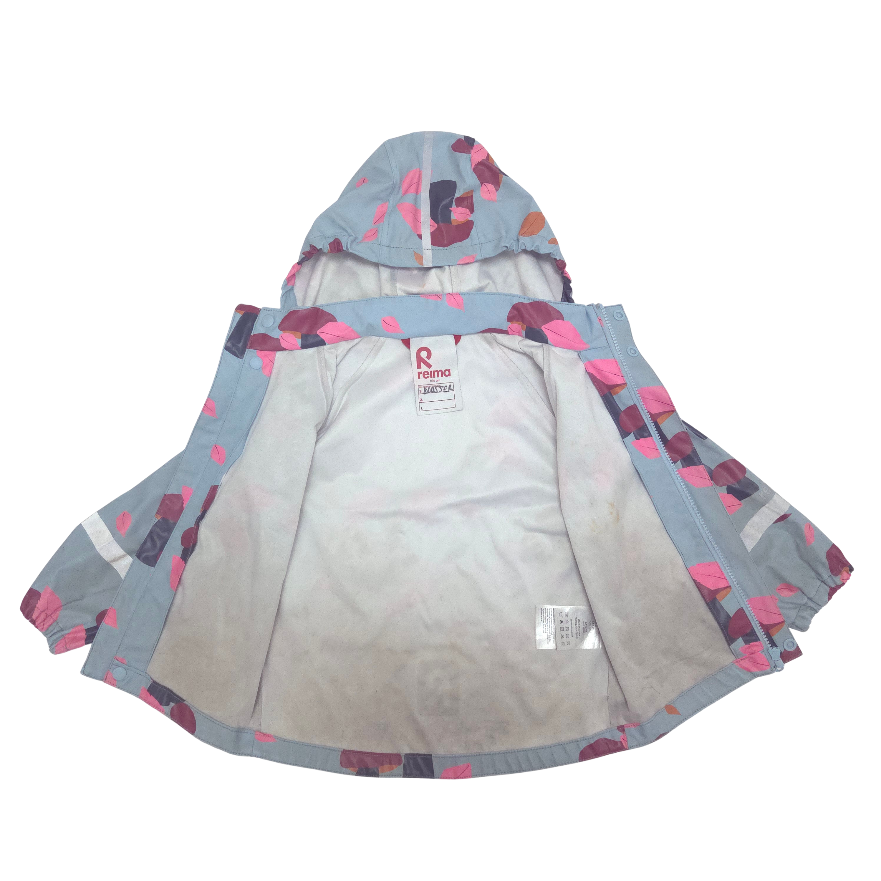 Children's raincoat with leaf pattern on a white background